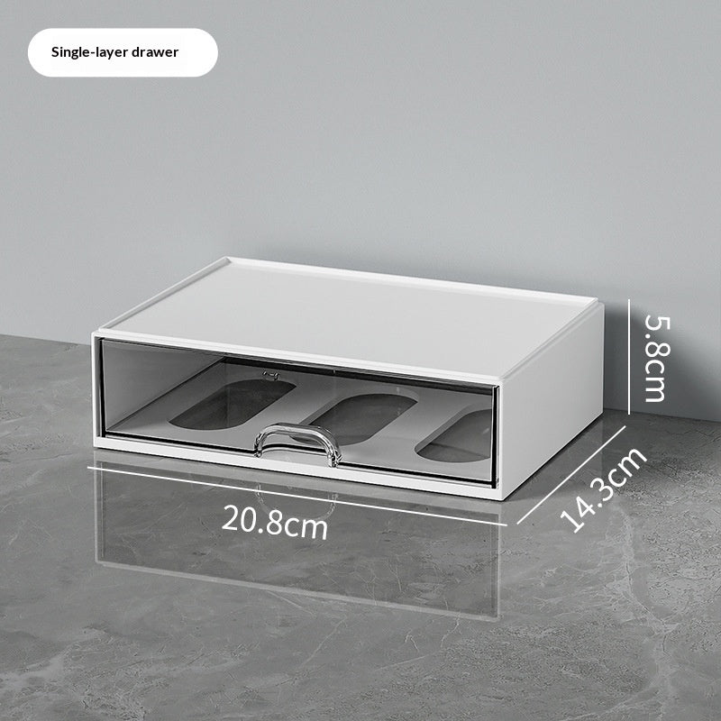 Transparent drawer desk organizer with multiple compartments for easy access and neat storage of office supplies.