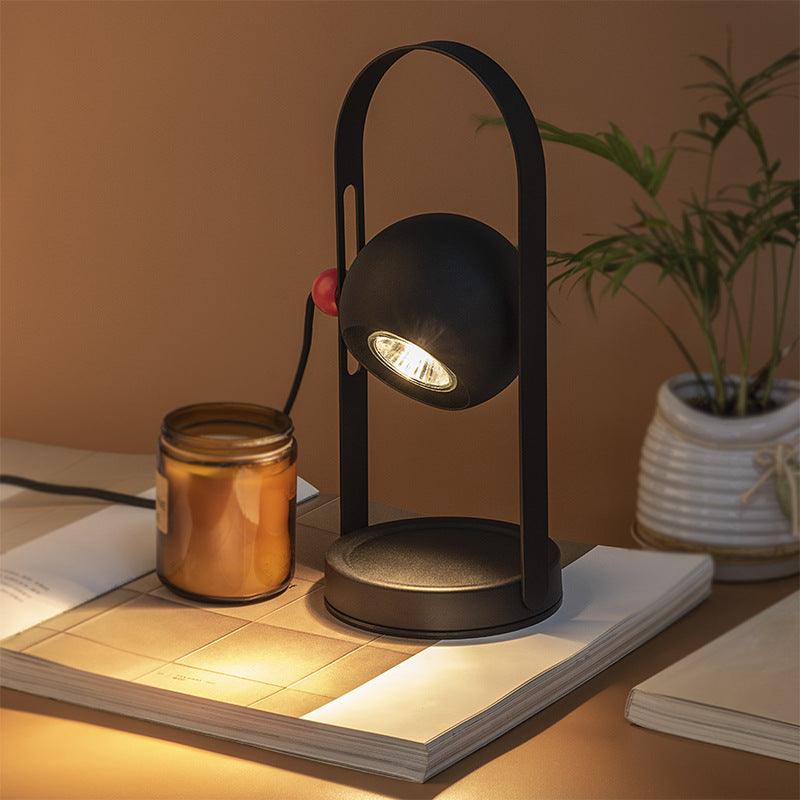 Aromatherapy wax lamp emitting warm glow, with fragrant wax and calming scent, enhancing relaxation and cozy evenings.
