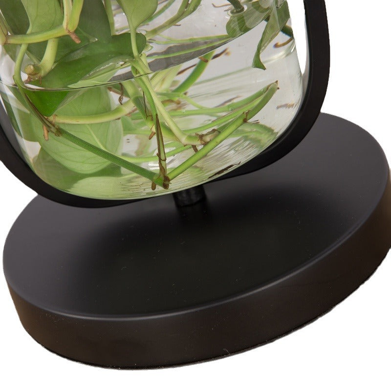 Modern hydroponic grow lamp with sleek design, providing optimal lighting for healthy indoor plant growth and greenery.
