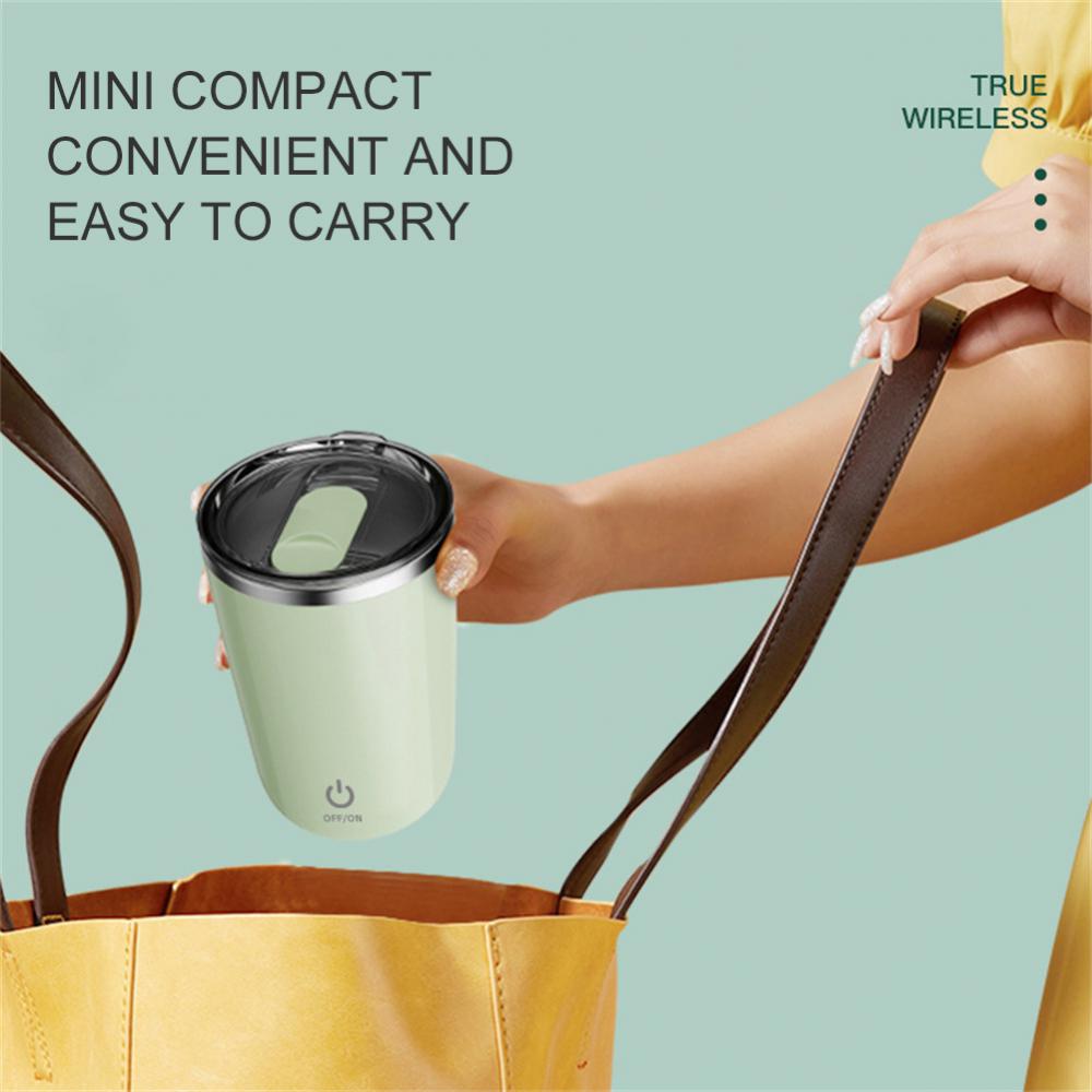 Magic self-stirring mug with a sleek design, featuring a button to effortlessly mix drinks inside the mug.