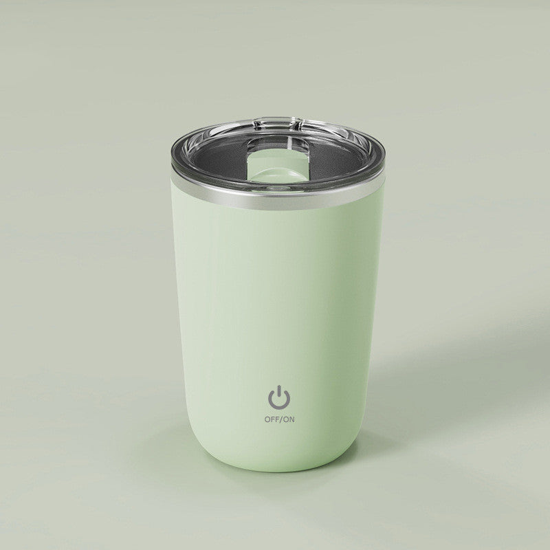 Magic self-stirring mug with a sleek design, featuring a button for effortless mixing of beverages in the cup.