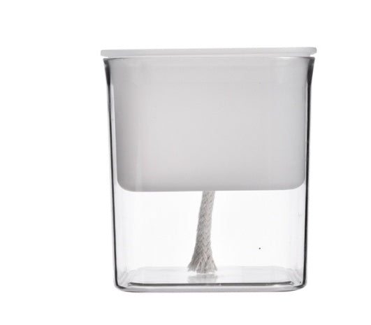 Clear hydroponic planter for indoor gardening, showcasing healthy roots and water circulation for thriving plant growth.