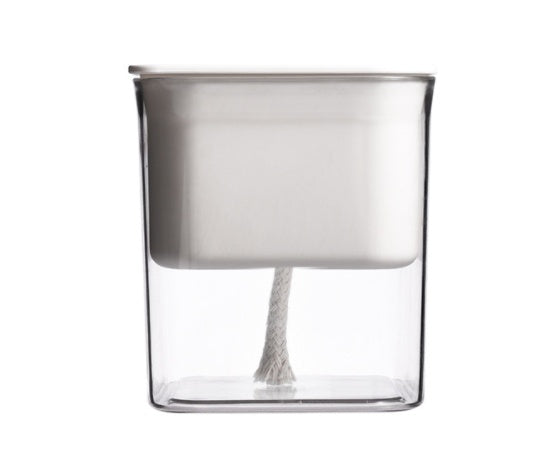 Transparent hydroponic planter for indoor gardening, showcasing healthy roots and lush green plants growing without soil.