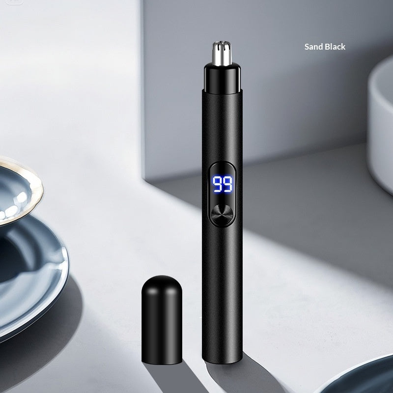 Close-up of the QuickTrim Nose Hair Trimmer showing its compact design and precision trimming head for easy grooming.