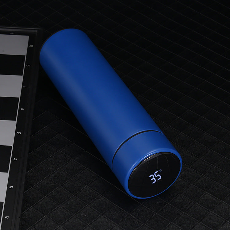 Smart water bottle with a sleek design, featuring temperature display and a spill-proof lid for staying hydrated on the go.