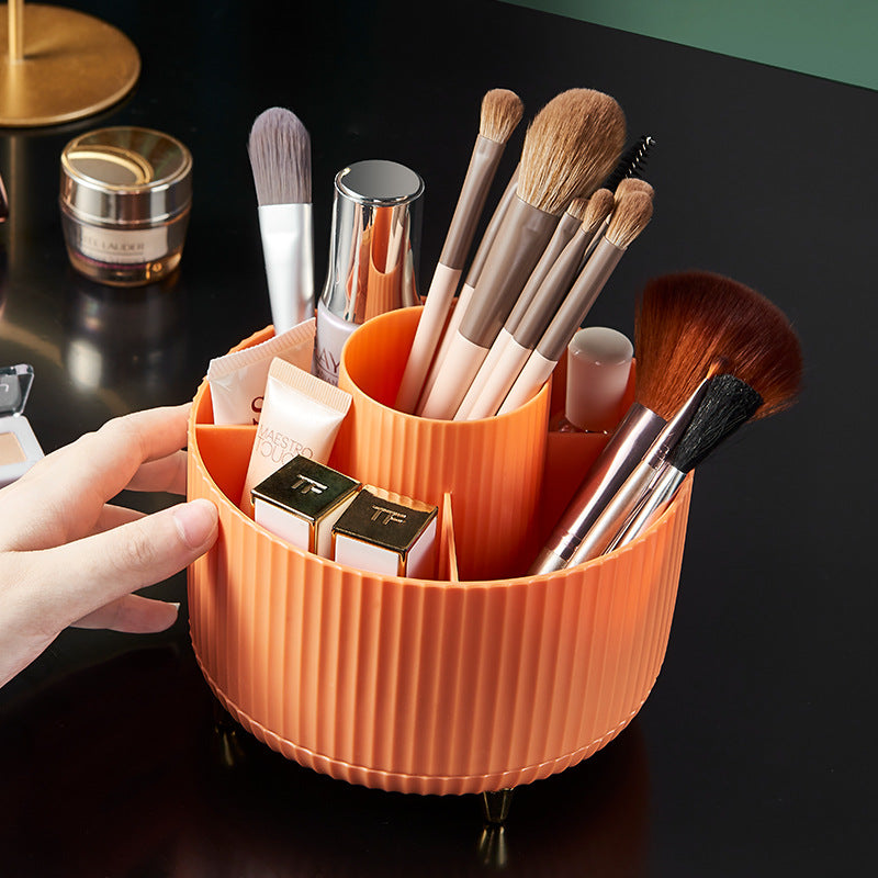 Beauty brush organizer with multiple compartments for storing and keeping makeup brushes clean and easily accessible.