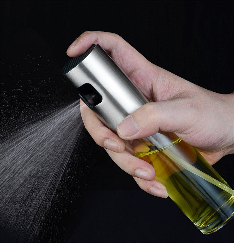 Spray bottle for oil, ideal for grilling, baking, and cooking, featuring a simple design for easy oil application.