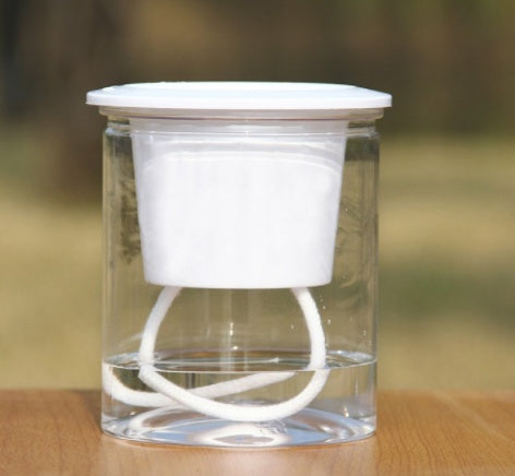 Double-tier self-watering planter with two levels for easy plant growth, ideal for indoor or outdoor gardening.