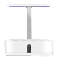 Hydroponic garden planter with lush green plants, showcasing soil-free indoor gardening for fresh herbs and vegetables.